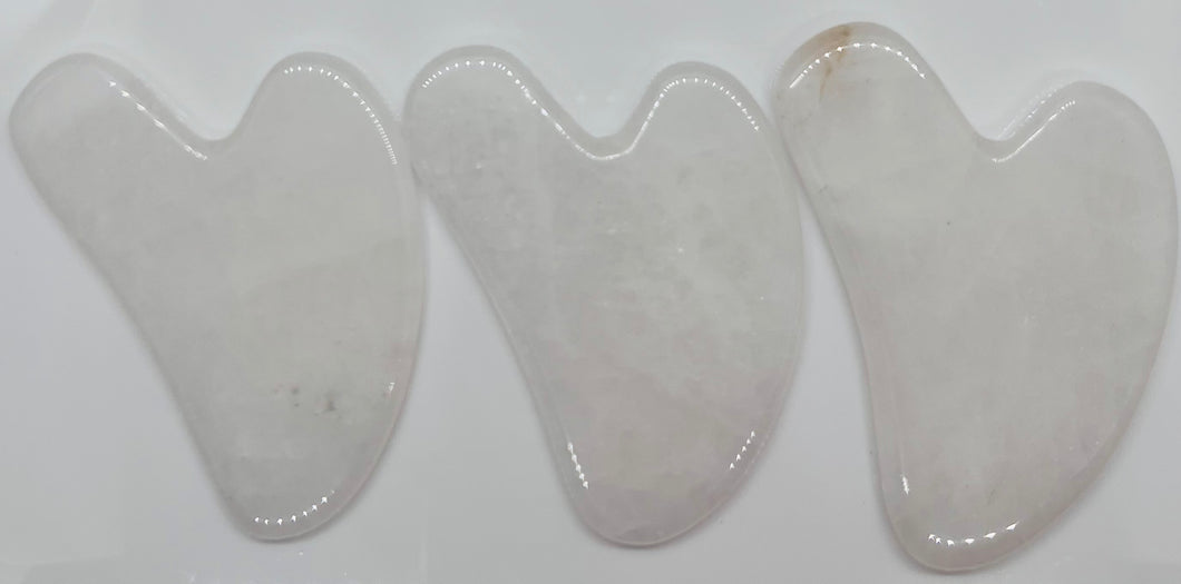 natural white jade gua sha facial sculpting